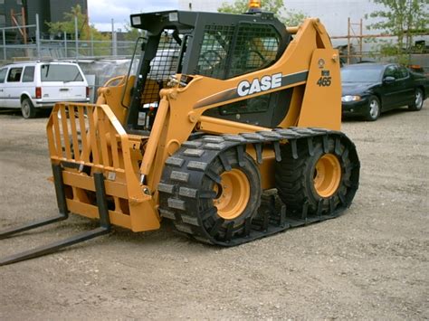 john deere 320 skid steer over the tire tracks|bobcat skid steer tracks.